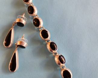 Marked Sterling Silver Bracelet and Earrings.