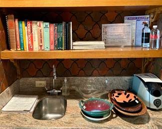 Cook books, sink & granite countertop