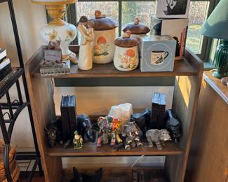 Wood bookshelf with an assortment of bookends, see following photos