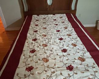 Full size antique headboard with platform bed with storage drawers underneath.
