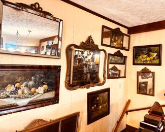Beautiful vintage art pieces and mirrors
Located in dining room