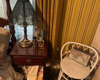 White wicker chair, bedside table