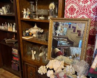 Seashells, large conch shells, bookshelf, gold detailed mirror, crystal, silver plated decor, soup tureen