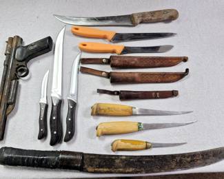 Collectible knifes and pellet gun. 3 pcs. "Buck" knife set, 2 pcs. "Fiskers" set and 3 pcs. "Rapala J. Martini Finland" knife set w/ sheaths. 
"Crosman 130" pellet gun
