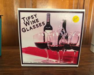 Love these Tipsy Wine Glasses