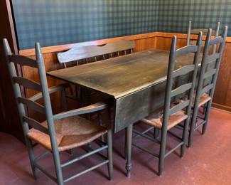 Drop Leaf Table with 4 ladder back chairs and bench.  Chairs have rush seats