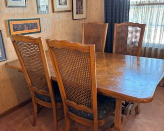 Hickory Mfg Co North Carolina Dining Set. Trestle Table with 2 leaves. 6 Caned back chairs and 1 cane back arm chair