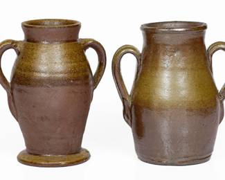 Two Salt-Glazed Stoneware Vases, Middle TN origin, late 19th or early 20th century, both of ovoid form with flared rims and two vertical strap handles, each coated in a salt glaze over brown slip. Both in excellent condition, one with two miniscule nicks to foot, the other with some in-the-firing roughness to top of rim. H (of taller) 6 7/8". ($250-$400)
