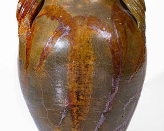 Extremely Rare Glazed Redware Jar with Exuberant Manganese Brushwork, Stamped "HAUN," Christopher Alexander Haun, Greene County, TN, circa 1840-1860 ($5,000 - $8,000)