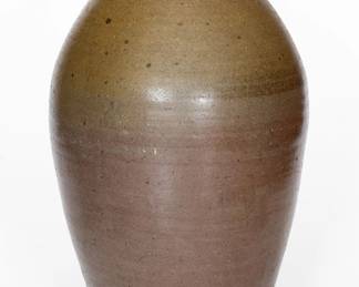 Salt-Glazed Stoneware Jug, Middle TN origin, possibly Spears Family, second half 19th century, ovoid jug with tooled shoulder and distinctive, angular spout, the upper body dipped in reddish-brown slip, the entire surface covered in a clear salt glaze. Spout with two chips and some minor nicks and wear. A minor nick to handle. H 19 1/4". ($200-$300)
