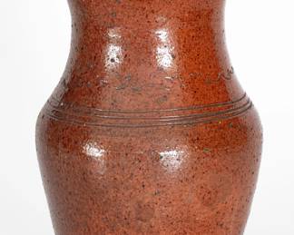 Glazed Redware Pitcher, attributed to the Cain Pottery, Sullivan County, TN, circa 1850-1880.  ($300-$500)
