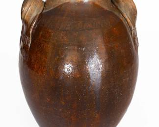 Exceedingly Rare and Important Glazed Redware Jar with Dipped Manganese Decoration, Stamped "J. A. LOWE," John Alexander Lowe, Greene County, TN, circa 1852-1862 ($25,000 - $40,000)