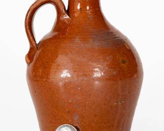 Small Glazed Redware Jug, Eastern TN origin, second or third quarter 19th century ($300-$500)