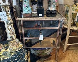 Vintage mirror clad bedside chest.