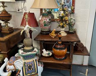 Vintage bamboo side table, Glazed terracotta elephant.