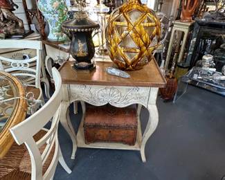 Pair of painted Italian bedside tables with cabriole legs and shelf strether, Oversized pierced tortoise-glazed Italian pottery lamp.