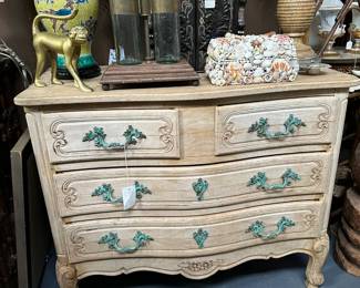 Bleached oak commode with verdigris bronze hardware, Antique tantalus, Shell encrusted domed-top box, Gilt metal monkey, Chinese Export ginger jar lamp, Early 19th century, bone inlaid vargueno top.