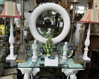 Gampei-Stoll elephant console. Paul Hansen Baccarat columnar lamps, Springer style round mirror.