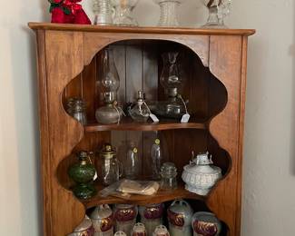 Oil lamps, canister set, and corner cabinet. 
