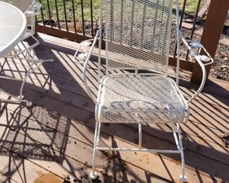 WHITE WROUGHT IRON PATIO SET WITH FOUR SPRING ACTION CHAIRS $150, UMBRELLA AND BASE $50