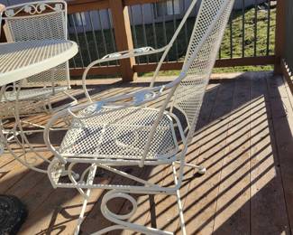 WHITE WROUGHT IRON PATIO SET WITH FOUR SPRING ACTION CHAIRS $150, UMBRELLA AND BASE $50