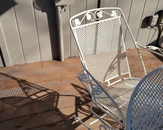 WHITE WROUGHT IRON PATIO SET WITH FOUR SPRING ACTION CHAIRS $150, UMBRELLA AND BASE $50