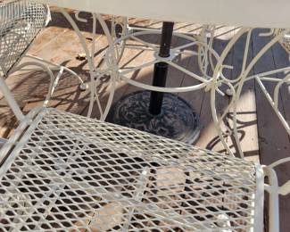 WHITE WROUGHT IRON PATIO SET WITH FOUR SPRING ACTION CHAIRS $150, UMBRELLA AND BASE $50
