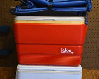 Two Igloo Coolers And A Cooler Bag On Wheels