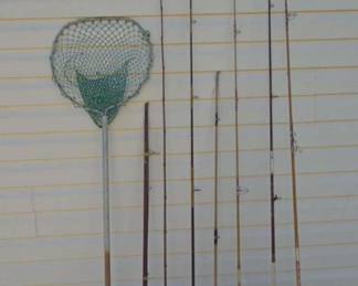 Collection Of Wooden Fiahing Poles And Net
