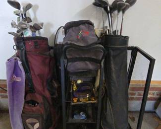 Two Sets Of Right Handed Golf Clubs With Storage Rack And Miscellaneous Items