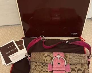  02 Coach Handbag With Pink Accents 