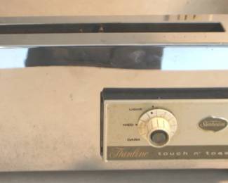 1027 - Sunbeam Thinline Touch & Toast Toaster 14" x 7" x 3" You are buying a used as-is electric/electronic item. We do not guarantee all components are present, and if it is not expressly stated, it is untested.