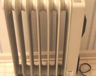 316 - Space Heater - 26" x 15" x 7" You are buying a used as-is electric/electronic item. We do not guarantee all components are present, and if it is not expressly stated, it is untested.