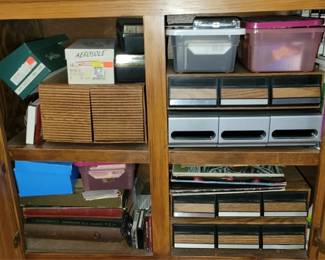 204 - Cabinet Lot Cassettes, VHS Tapes, and More