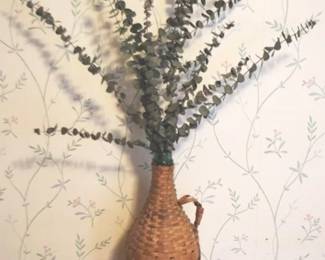 181 - Wicker Wrap Glass Bottle w/ Eucalyptus - 17" Tall