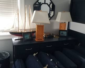 Dresser; mirror; two orange table lamps