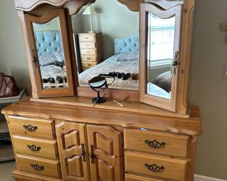 Dresser with mirrors and hideaway jewelry storage