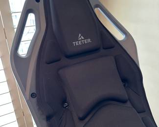 Teeter exercise machine