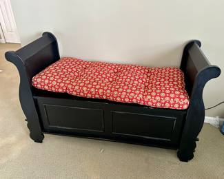 Sleigh style bench with hide away storage and cushion