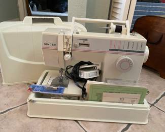 Singer sewing machine with case