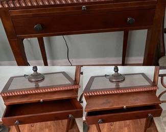 Wood table/ desk with glass. Has a drawer and pull out writing surface 