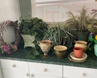 Pots and artificial flowers 