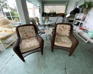 2 indoor/outdoor rattan style chairs with reversible cushions 