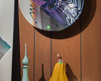 pottery decanter, gourd and wall art