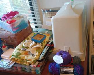 Sewing machine, desk and sewing supplies
