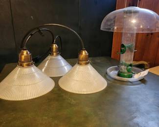 light fixtures and bird feeders and bird seed