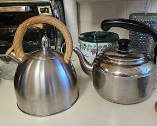 stainless tea kettles ... one is a whistler!