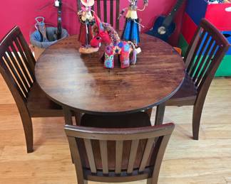 Solid wood table and 4 pottery barn chairs