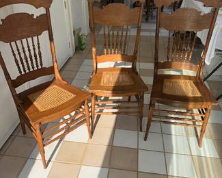Set of 3 oak spindle back dining chairs with caned seats 