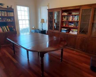 Great condition. Mahogany Dining Table with 5 leaves! 31" H x 50" wide!